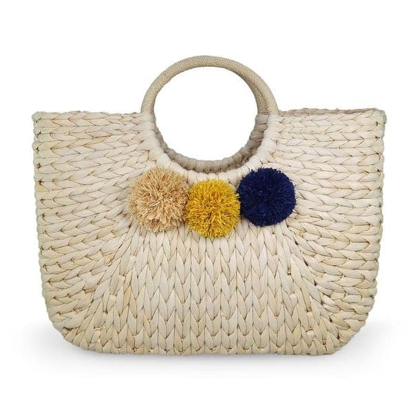 Round handle straw tote with raffia pom poms