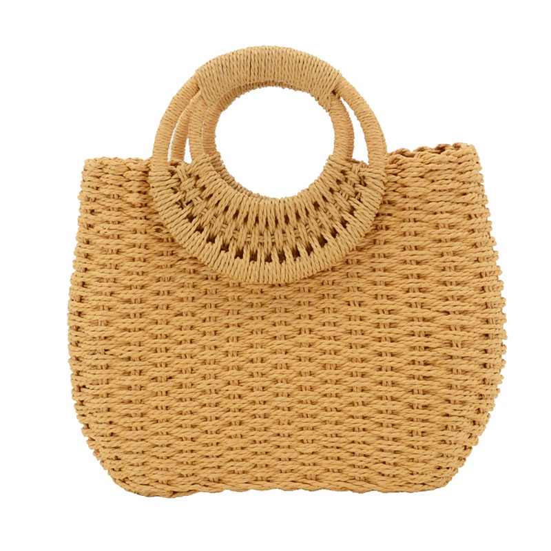 small round handle bag made with woven straw