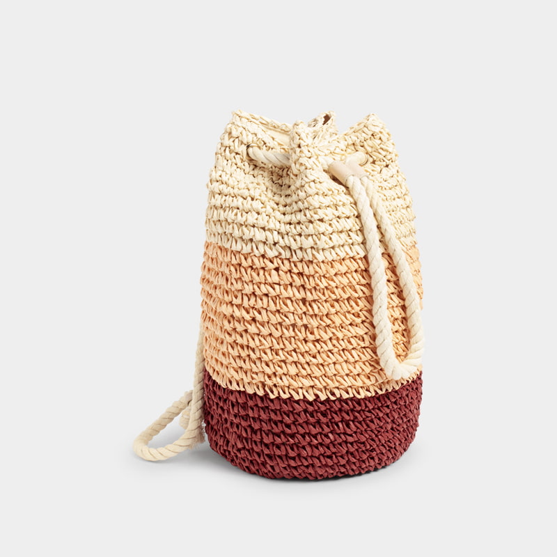 Crocheted woven paper straw backpack 