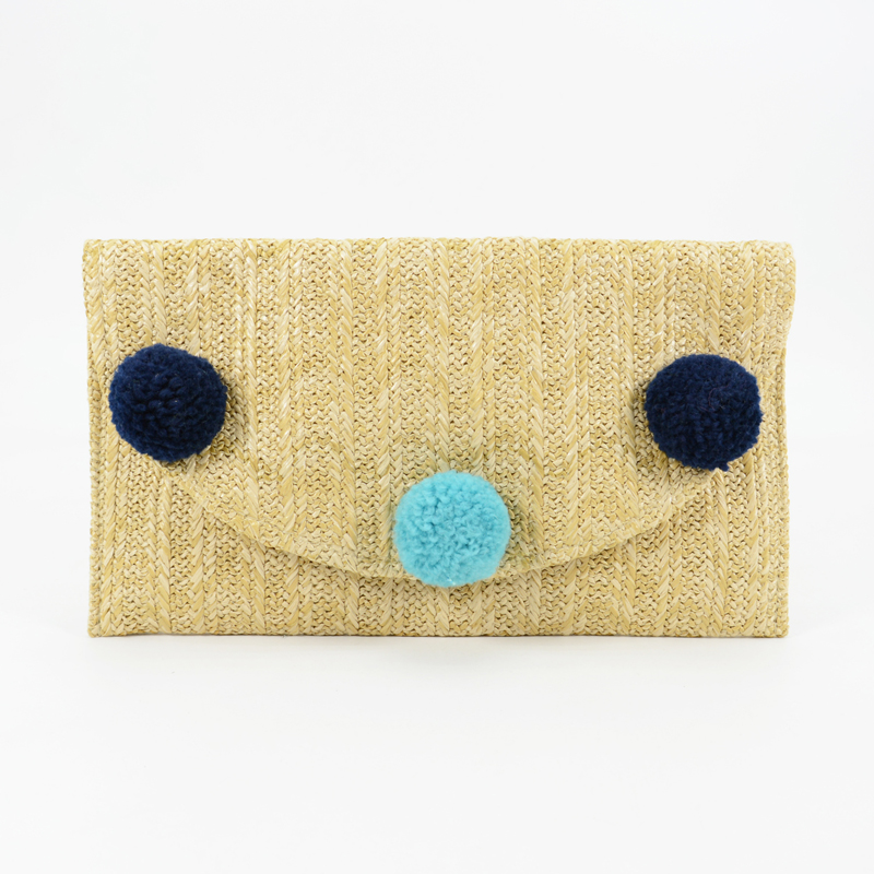 Pom poms straw clutch