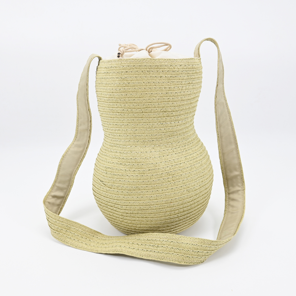 Handmade woven straw bucket bags